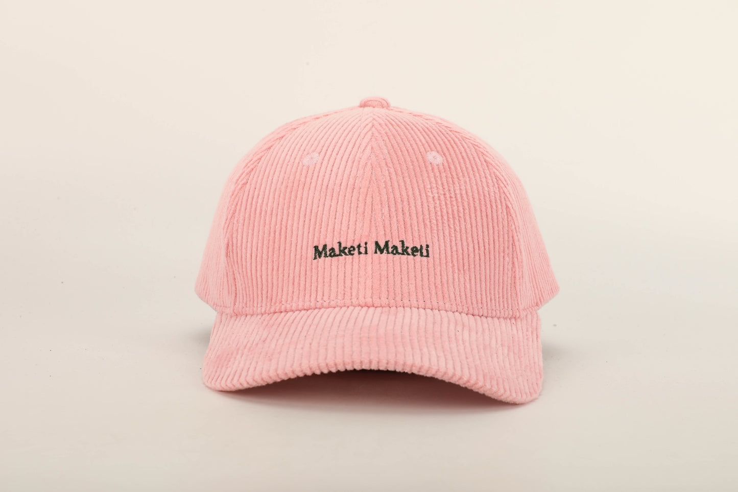 unisex pink corduroy cap green stitching brown leather buckle strap baseball cap front on