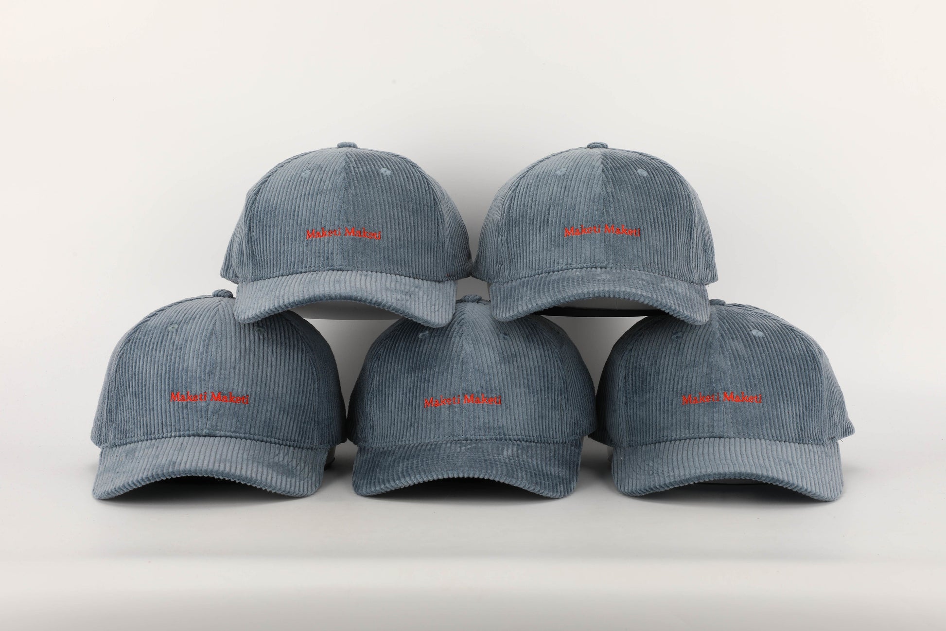 unisex blue corduroy cap orange stitching brown leather buckle strap baseball cap five caps face on
