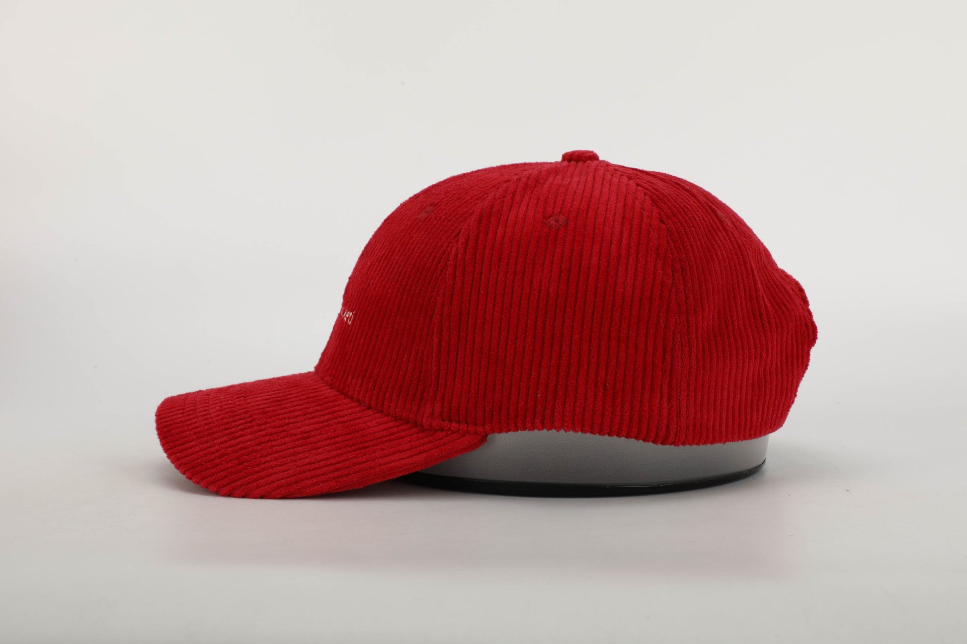 unisex red corduroy cap cream stitching brown leather buckle strap baseball cap side view